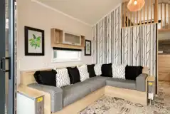 Ensuite glamping cabin double L-shaped sofa bed (bedding provided) Ensuite glamping cabin double L-shaped sofa bed (bedding provided)