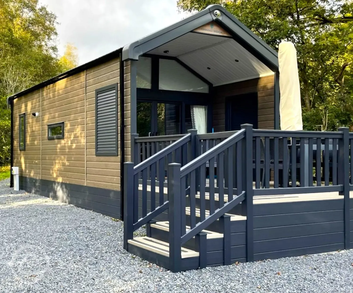 Ensuite glamping cabins with step access and private decks with seating