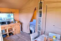 Safari tent kitchen area and double bedroom Safari tent kitchen area and double bedroom