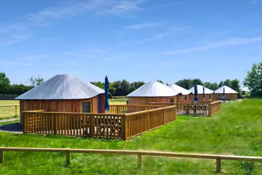 Wooden yurts at Daleacres Experience Freedom Glamping