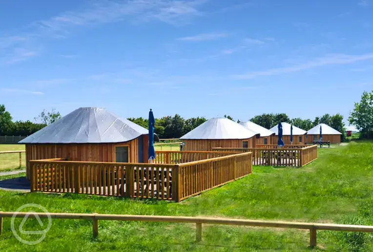 Wooden yurts at Daleacres Experience Freedom Glamping