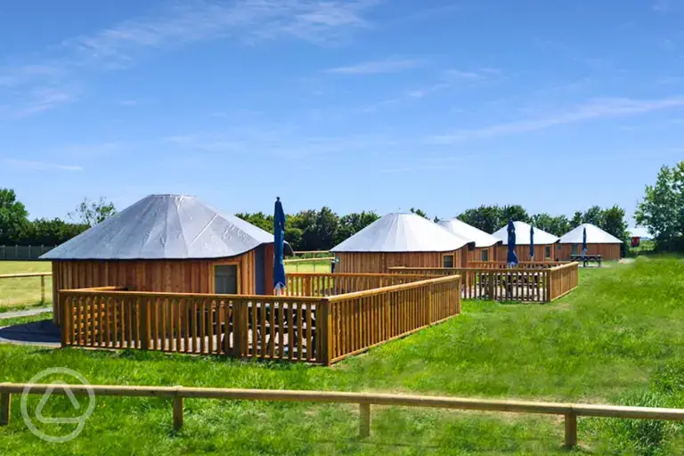 Wooden yurts at Daleacres Experience Freedom Glamping