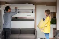 Ensuite glamping pod with a fold-down bed and bedding Ensuite glamping pod with a fold-down bed and bedding