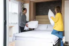Ensuite glamping pod with a fold-down bed and bedding Ensuite glamping pod with a fold-down bed and bedding