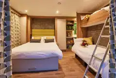 Ensuite glamping pod with a fold-down bed and sofa/bunk bed Ensuite glamping pod with a fold-down bed and sofa/bunk bed