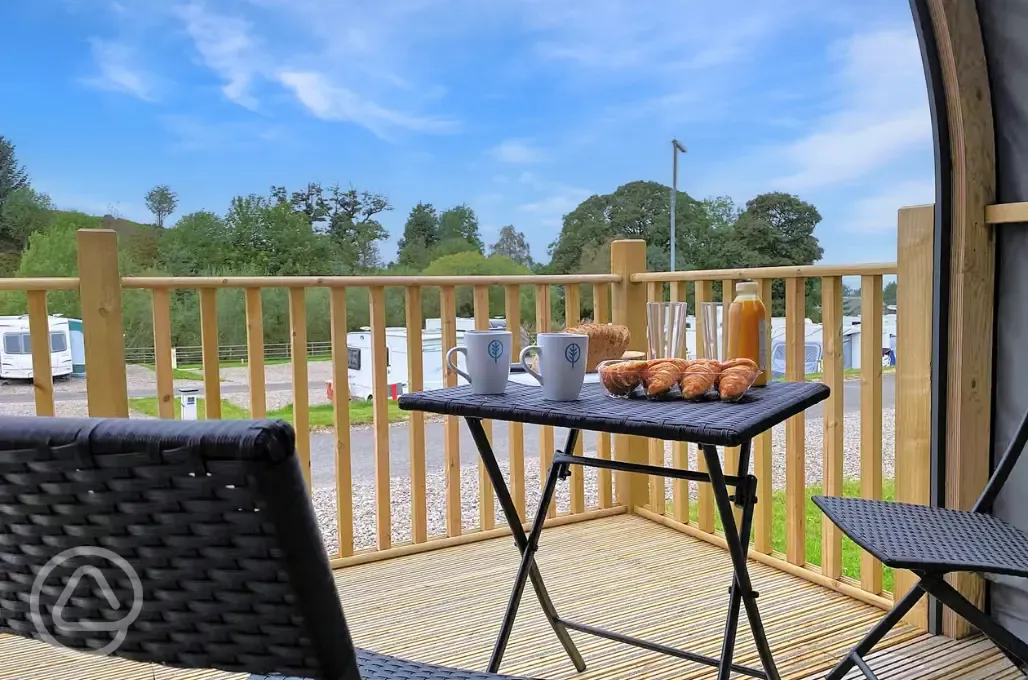 Accessible ensuite glamping pod outdoor seating area