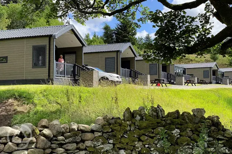 Ensuite glamping cabins with covered outdoor deck areas