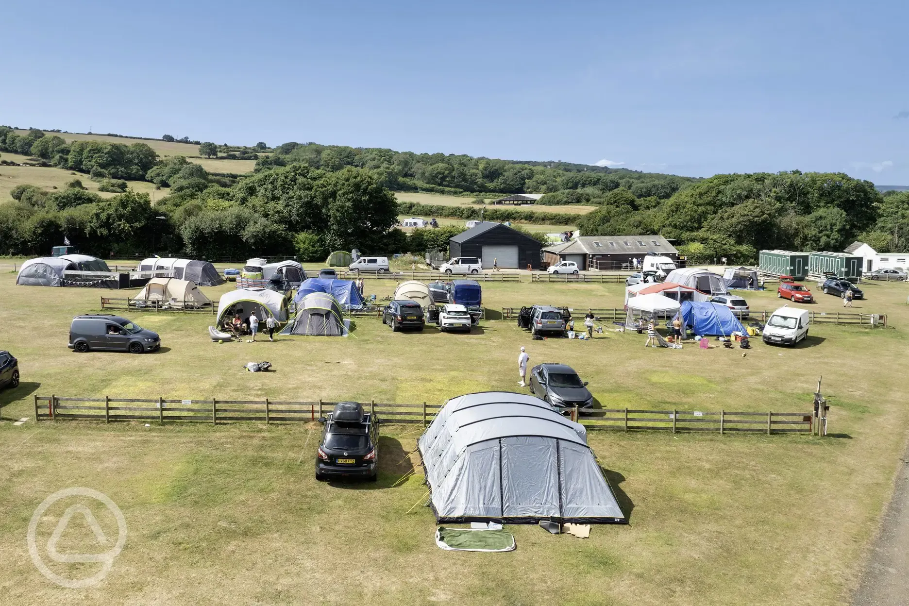 Aerial view of the electric grass pitches for tents and tourers