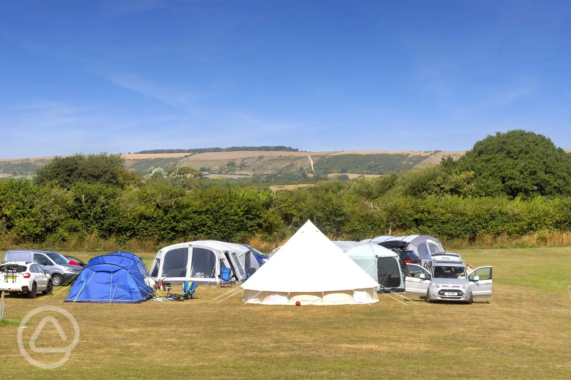 Large tents on electric grass pitches