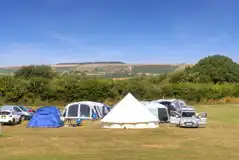 Large tents on electric grass pitches