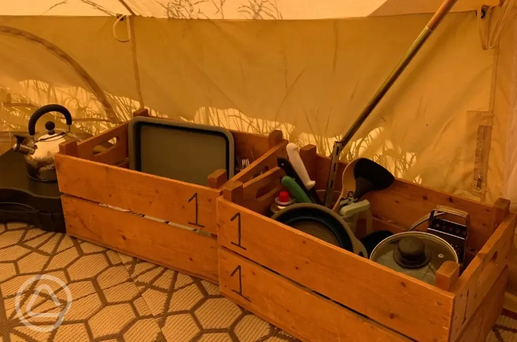 Crockery and cutlery provided in the bell tent