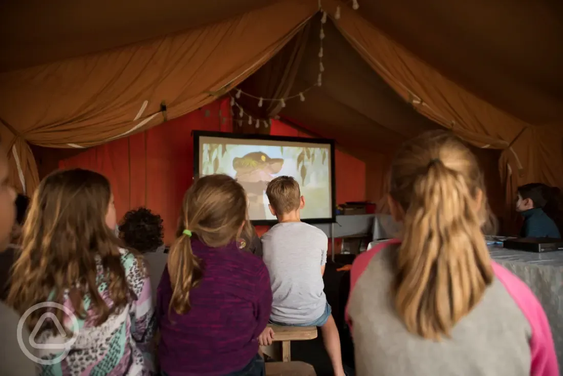 Communal tent with films for kids