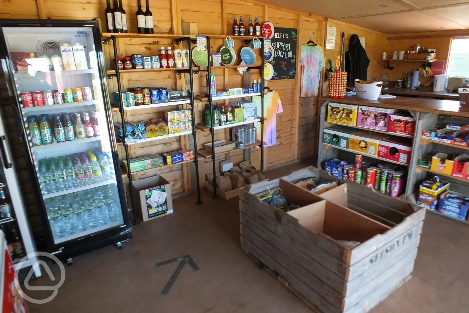 Shop for camping essentials. Hot and cold drinks available.