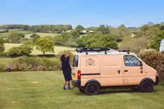 Large electric grass pitches with 16 amp hook up - Buttercup (10m x 10m)