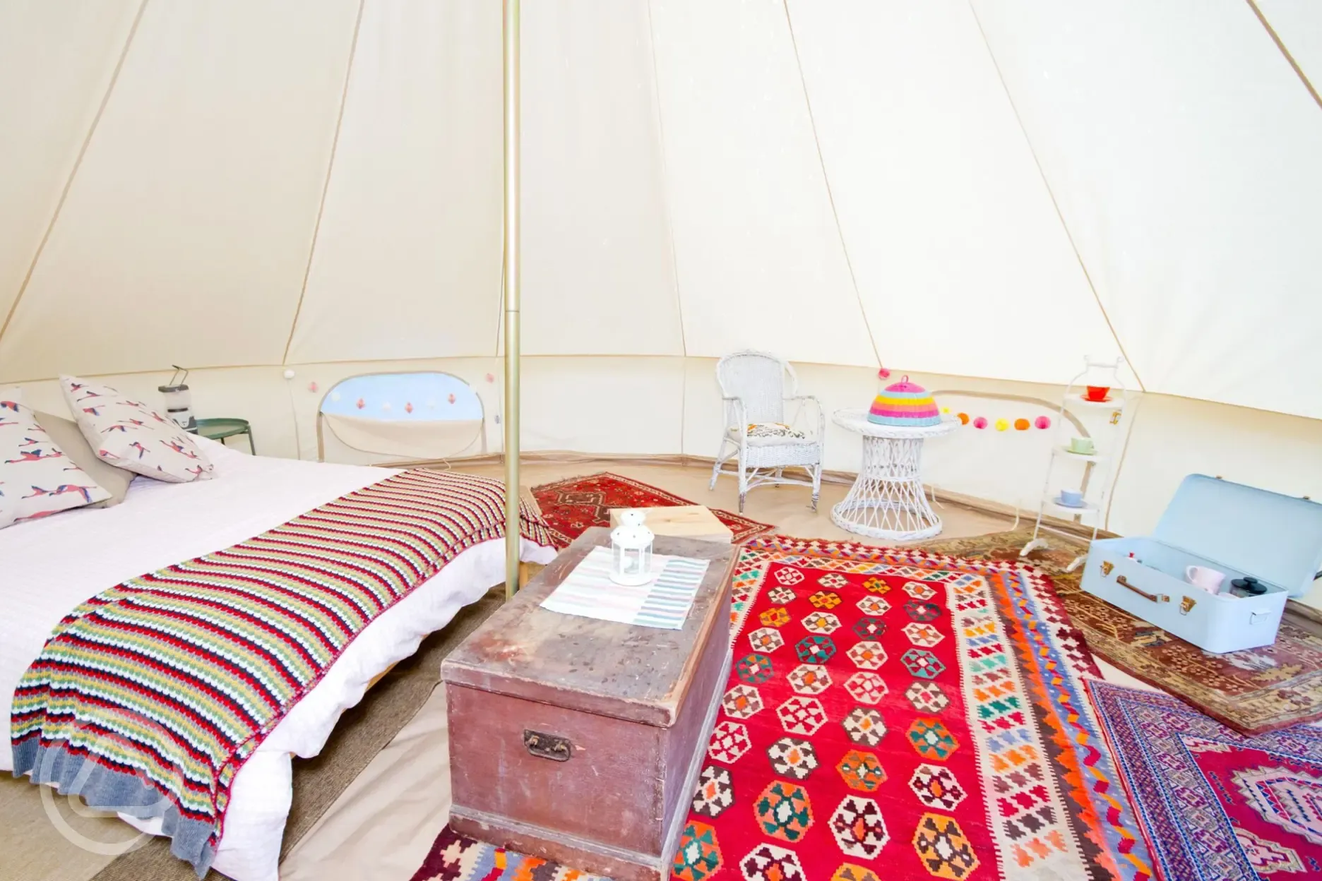 Bell tent with a double bed with bedding and extra camp beds (bring bedding)
