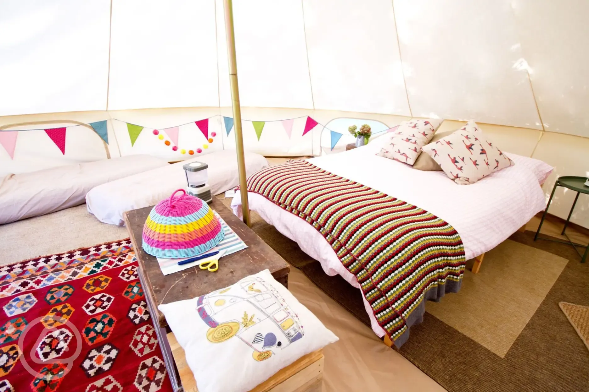Bell tent with a double bed with bedding and extra camp beds (bring bedding)