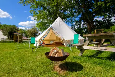 5m bell tent with outdoor seating and fire pits for hire