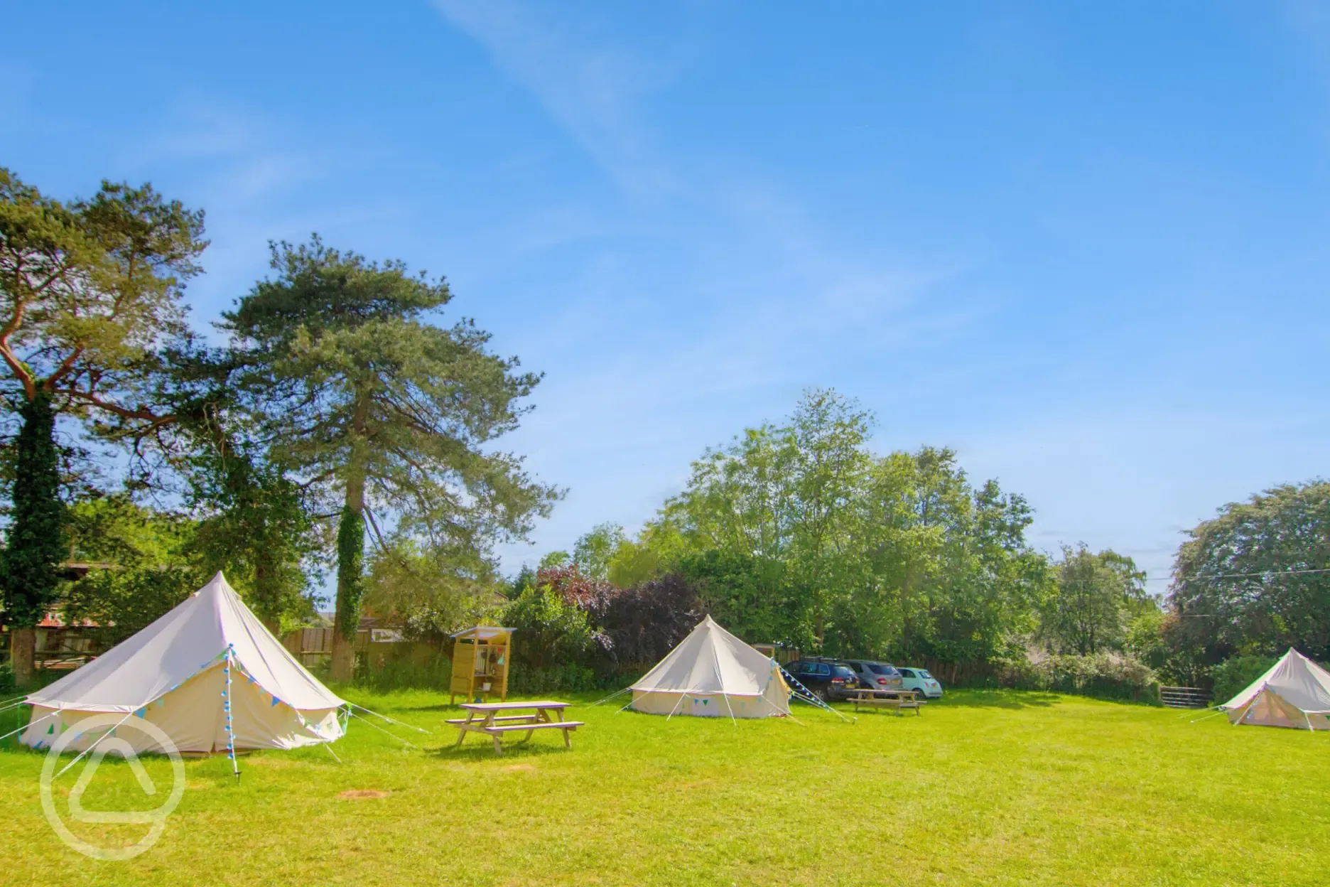 Bell tents with picnic benches