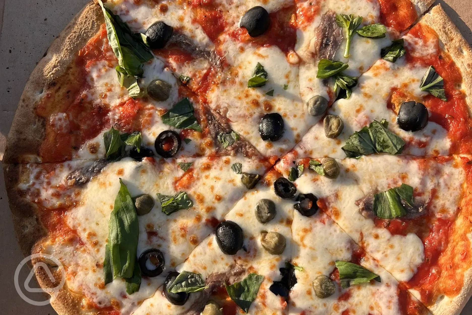 Wood-fired pizza oven every Saturday night 