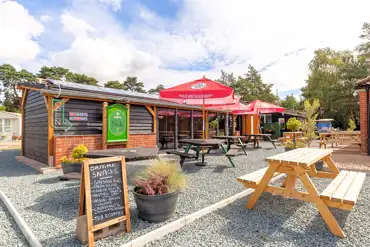 Ben's Bar and outdoor area, offering beer, wine, hot/cold snacks and live sport