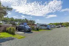 Fully serviced hardstanding pitches (pine views) with picnic hut Fully serviced hardstanding pitches (pine views) with picnic hut