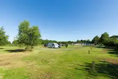 Grass fully serviced pitches (pine views) Grass fully serviced pitches (pine views)