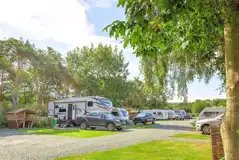 Fully serviced hardstanding pitches (pine views) with picnic hut