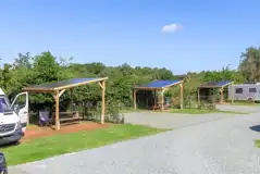 Fully serviced hardstanding pitches (pine views) with picnic hut