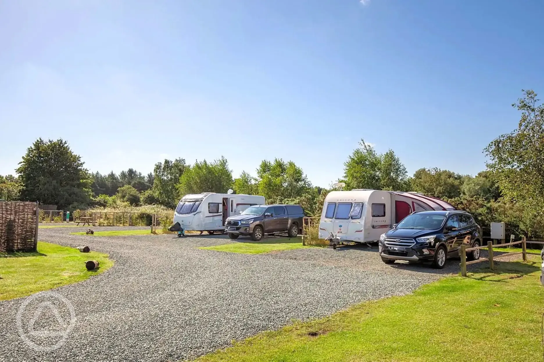 Fully serviced hardstanding pitches - pine views - bench only