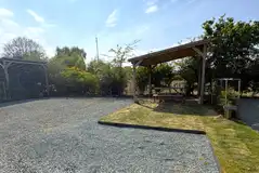 Fully serviced hardstanding pitch with a pergola