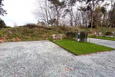 Fully serviced harstanding pitches with a picnic table or Jack and Jill seat