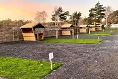 Fully serviced hardstanding pitches with picnic hut