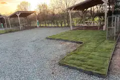 Fully serviced hardstanding pitch with a pergola