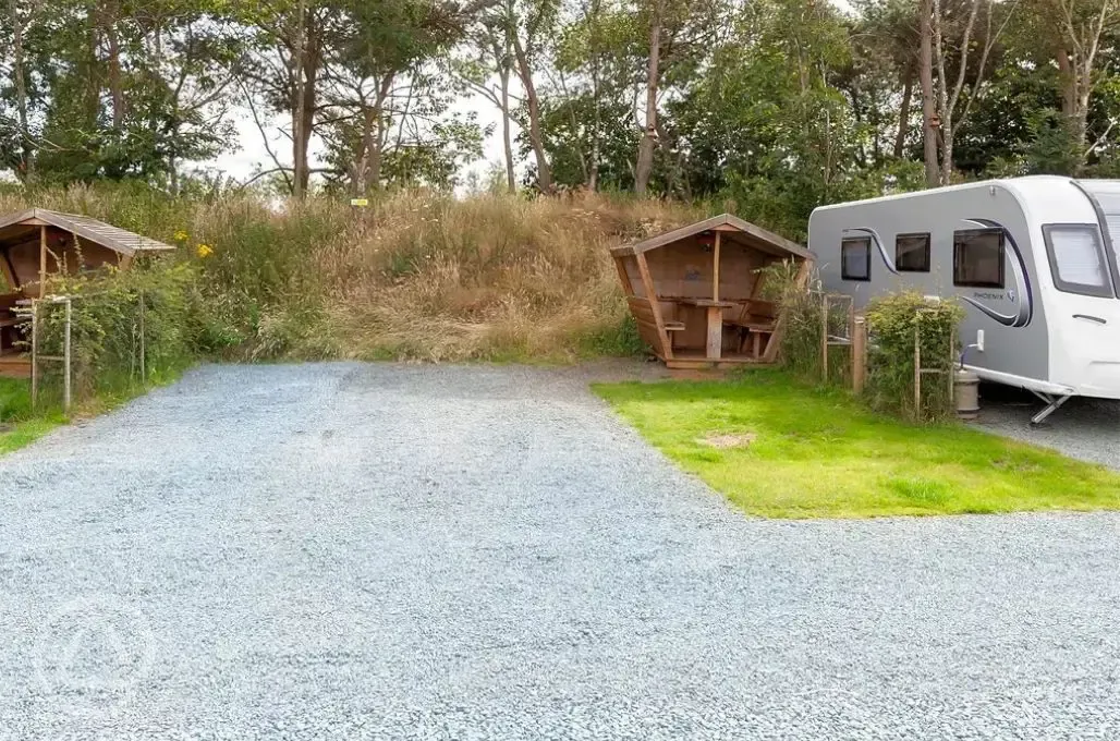Fully serviced hardstanding pitches (pine views) with picnic hut