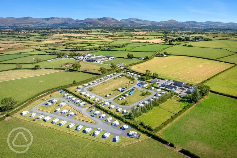 Aerial of Tai Hirion Farm overlooking Snowdonia mountain views