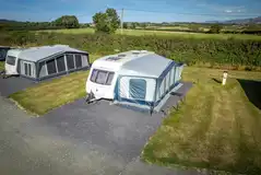 Fully serviced hardstanding pitches with awning space Fully serviced hardstanding pitches with awning space