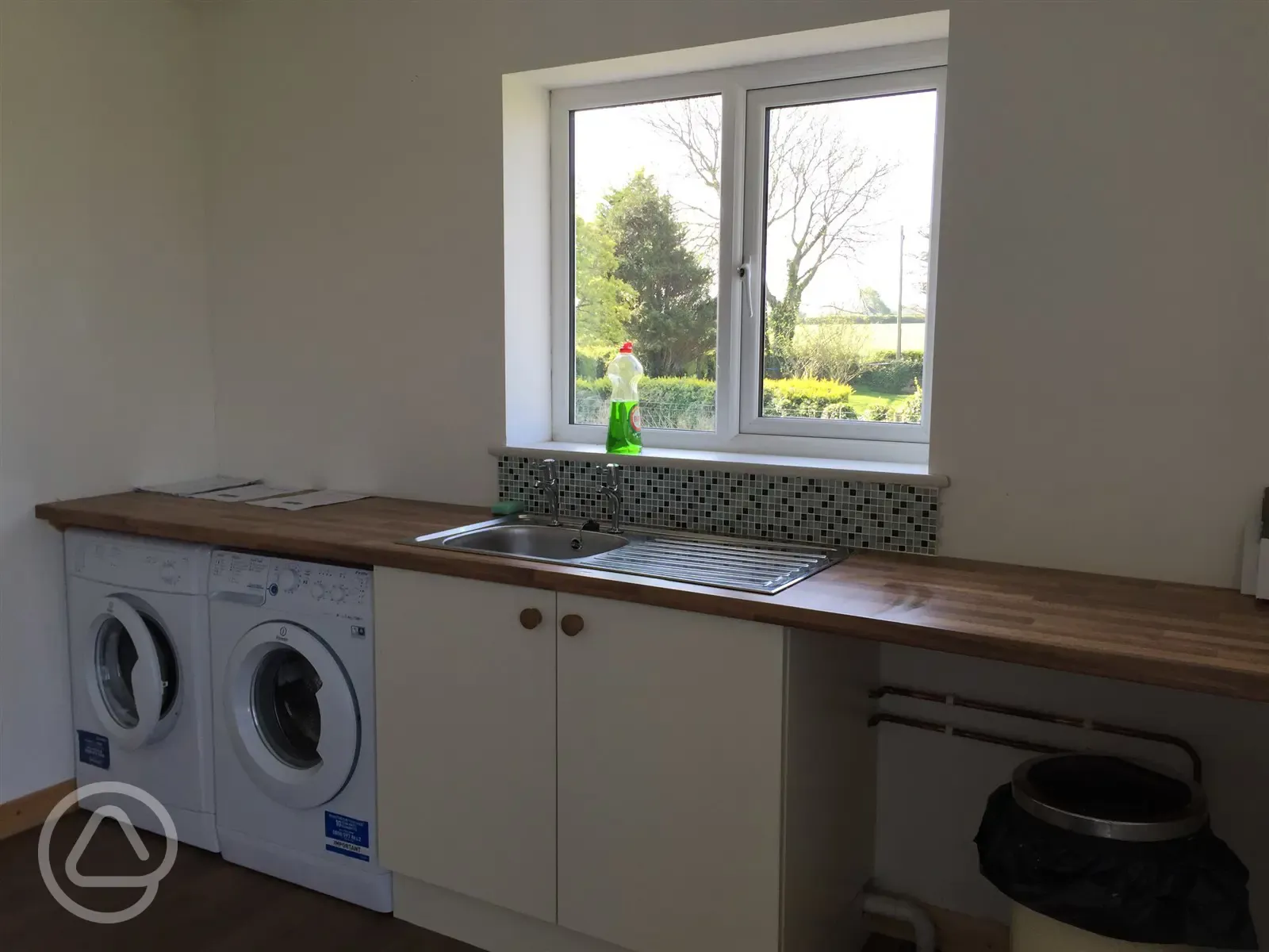 Laundry room and washing up area