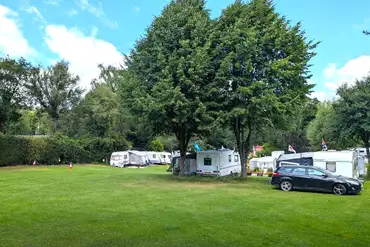 Grass pitches with optional, pay-as-you-go electric