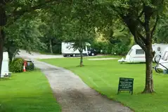 View to the hardstanding pitches with a central track