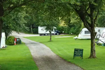 View to the hardstanding pitches with a central track