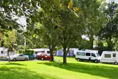 Grass pitches with optional, pay-as-you-go electric
