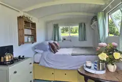 Lambing Hut interior with double bed
