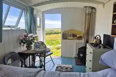 Lambing Hut interior with countryside views