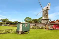 Ryeland shepherd's hut with outdoor furniture at Bircham Windmill
