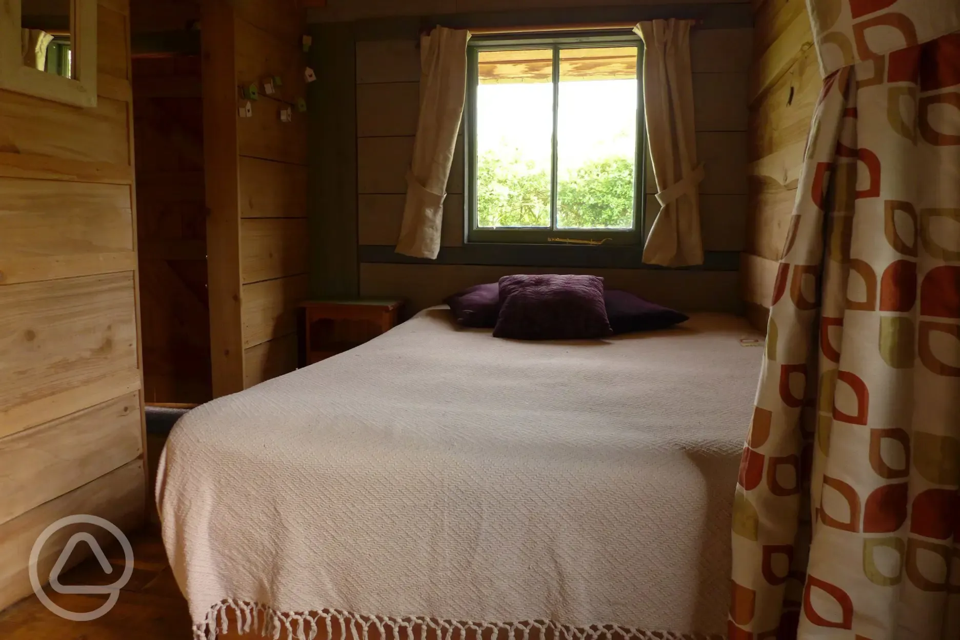 Double bed at Great Orchard Cabin