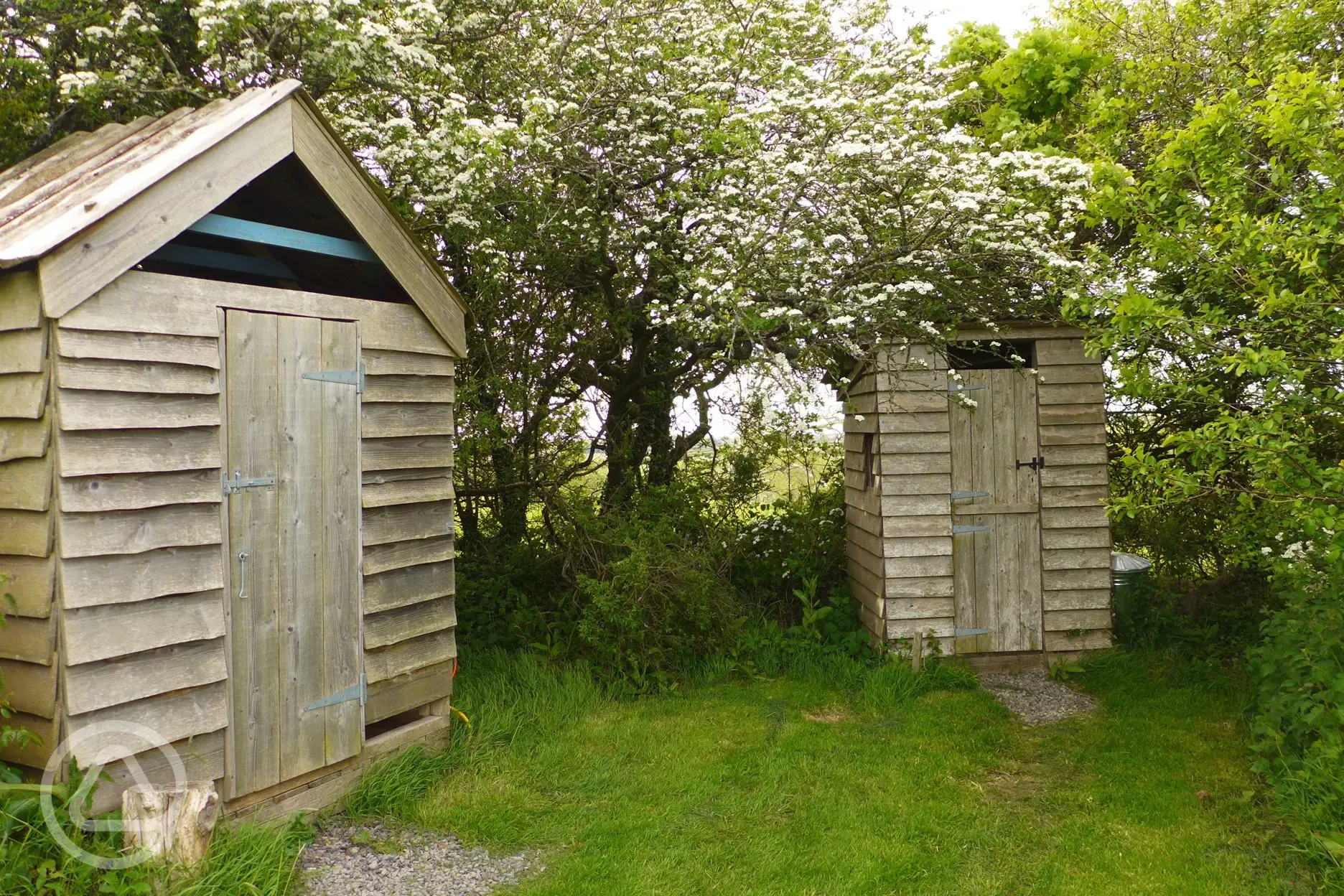 Compost toilet and shower huts at Great Orchard Cabin