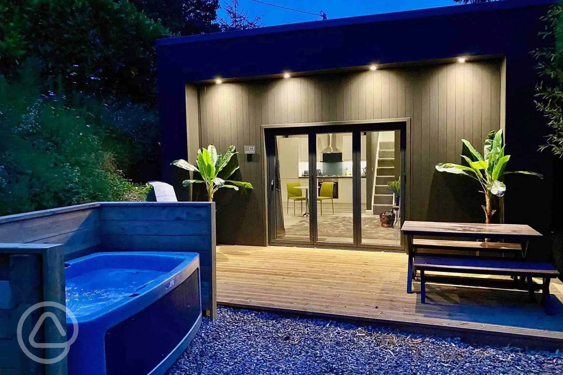 Sunrdige Cube with hot tub at night