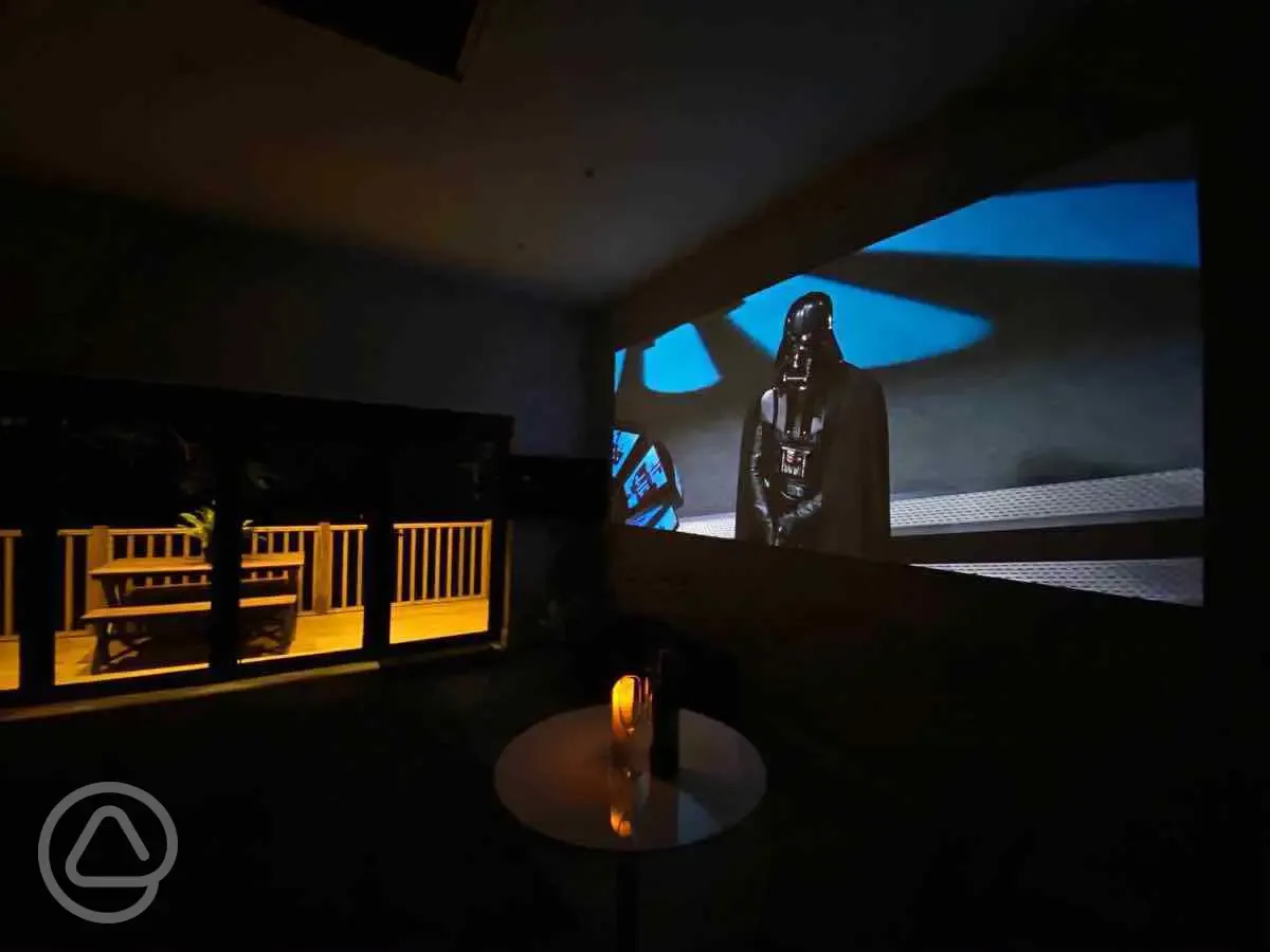 Sunrdige Cube with hot tub cinema projector