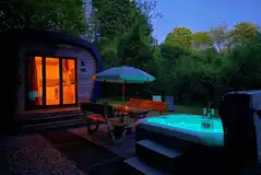 Sunridge Eco Pod with hot tub at night Sunridge Eco Pod with hot tub at night