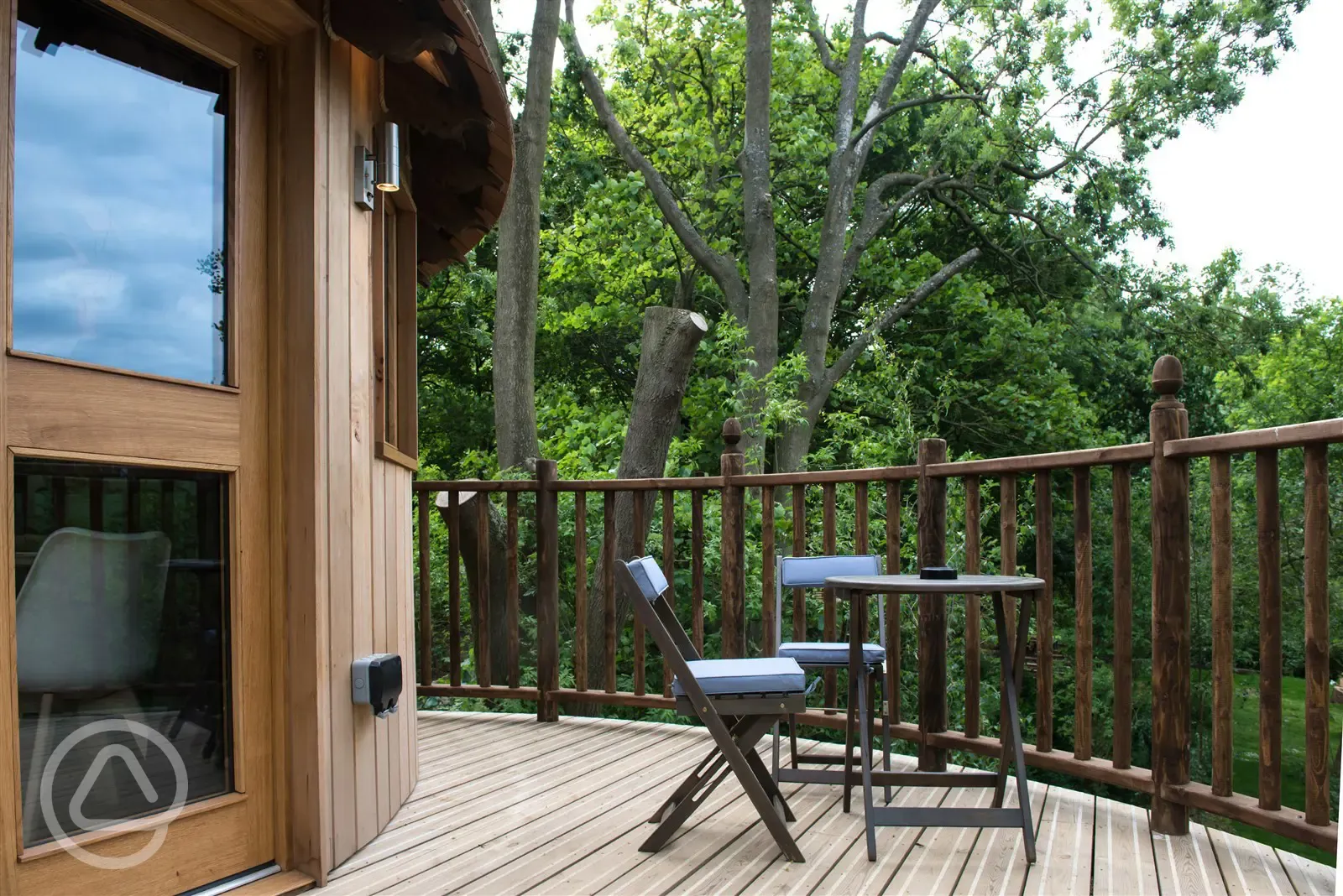 Treehouse balcony for alfresco dining or nightime stargazing. Unspoilt views up to village and church spire.